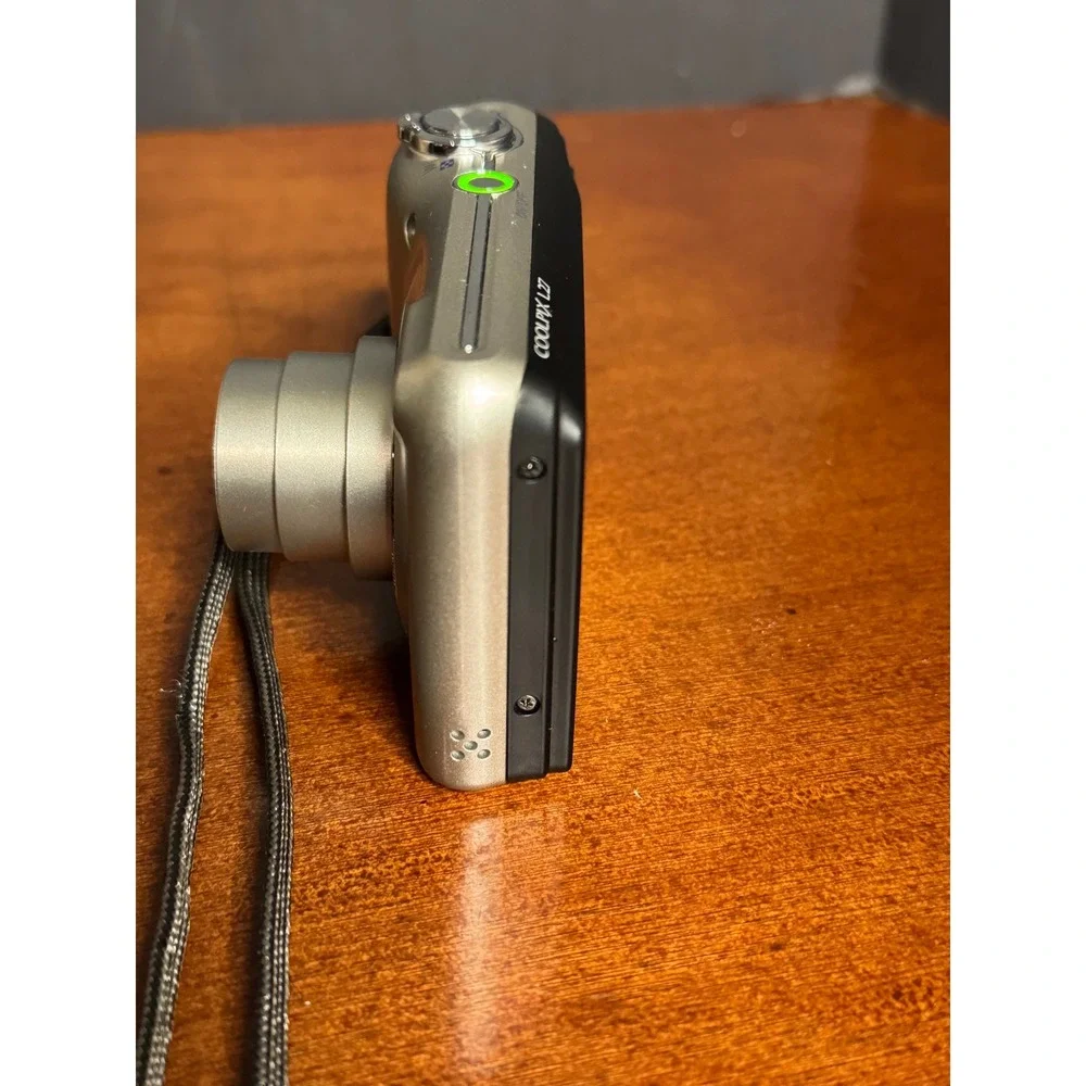 Nikon Coolpix L27 Silver 16.1MP Digital Camera 5x Zoom Bundle with 8GB SD Case